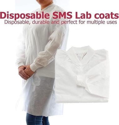 Abrigos de laboratorio desechables Blancos sin bolsillos Protectores para visitantes Polvo de polipropileno SMS No tejido